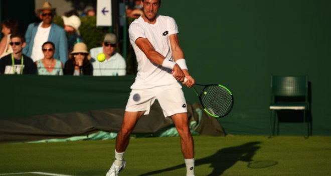 Džumhur poražen u prvom kolu Wimbledona, nastupit će i u konkurenciji dublova